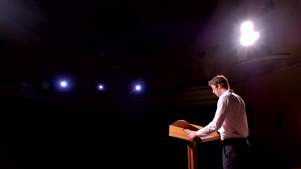 Video Stock Businessman Gives A Talk In An Auditorium Live Wallpaper For PC - Free Download