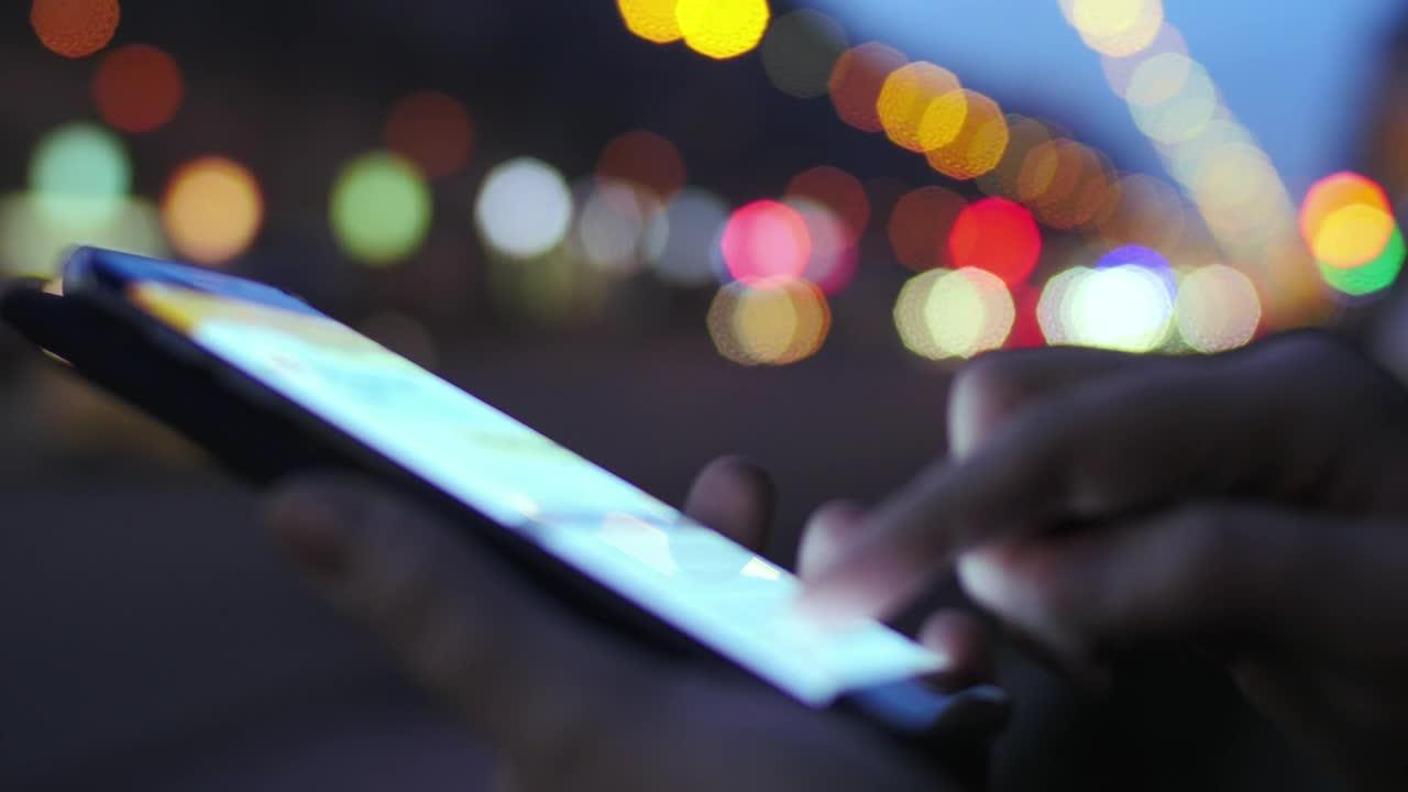 Free Video Stock texting in the city at night Live Wallpaper - Free Download