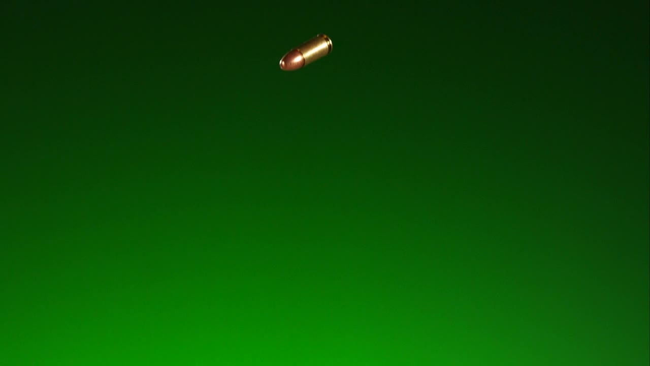 Stock Video Golden Falling Bullets With Green Background Live Wallpaper For PC - Free Download
