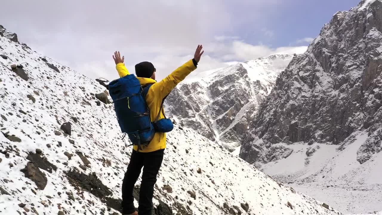 Stock Video Courageous Hiker Spreads Arms Over Mountain Summit Live Wallpaper For PC - Free Download