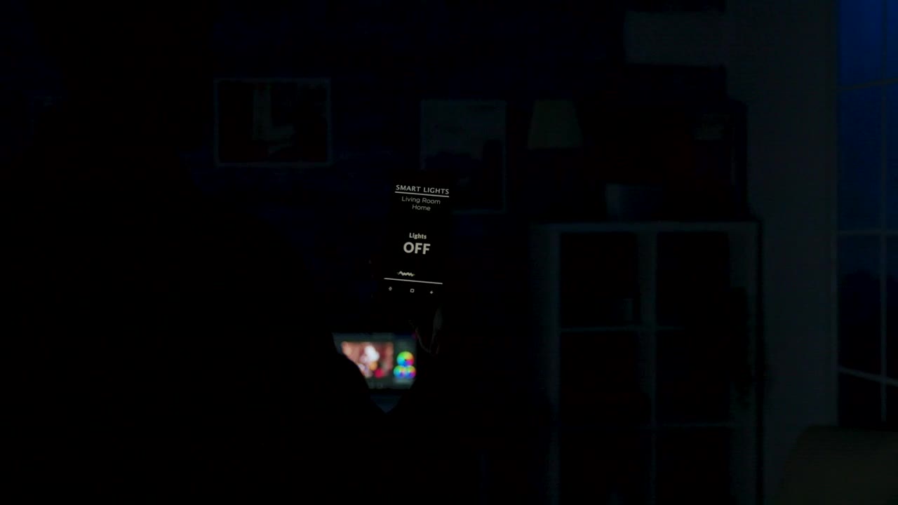 Stock Video Man Using Future App To Control Lighting From Mobile Phon Animated Wallpaper - Free Download