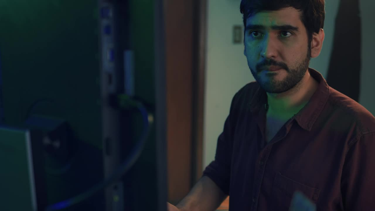 Free Video Stock Skilled Programmer Working In Front Of A Computer Live Wallpaper - Free Download