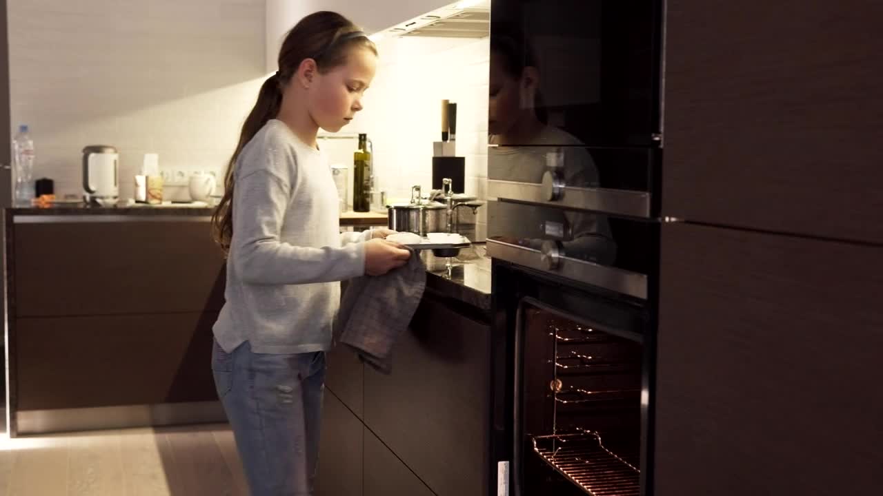 Stock Video Girl Putting Cookies In An Oven Live Wallpaper For PC - Free Download