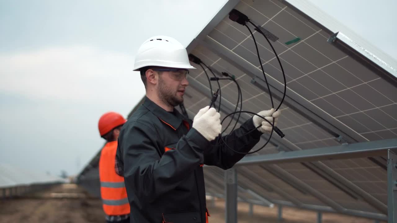 Stock Video Installing Solar Panels On A Cloudy Day Animated Wallpaper - Free Download