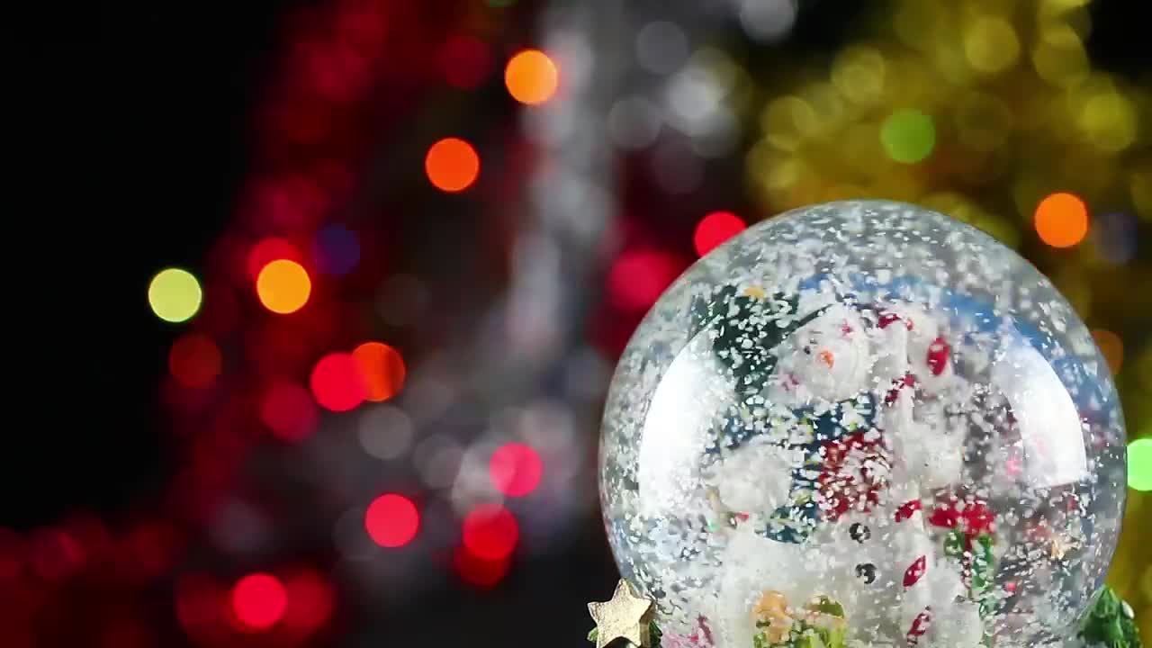 Video Stock Christmas Glass Ball With Defocused Lights Behind Live Wallpaper For PC - Free Download