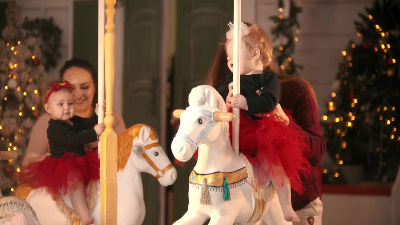 Stock Video Mothers Putting Their Babies On A Carousel Live Wallpaper - Free Download