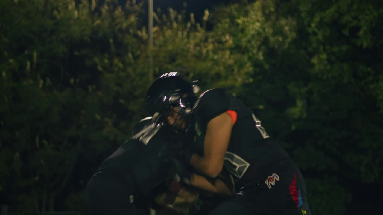 Free Video Stock three football players training at night Live Wallpaper - Free Download