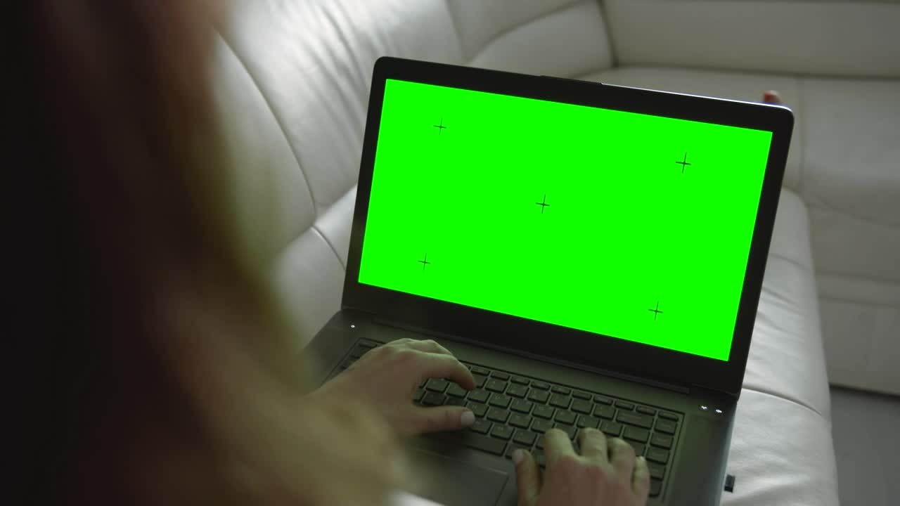 Free Stock Video Relaxed Woman Browses Website On Laptop Greenscreen Live Wallpaper - Free Download