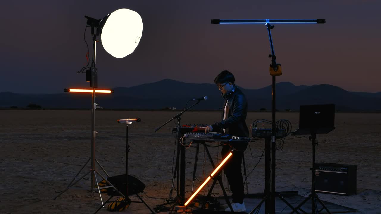 Stock Video Dj Playing With His Equipment In An Empty Desert Live Wallpaper For PC - Free Download
