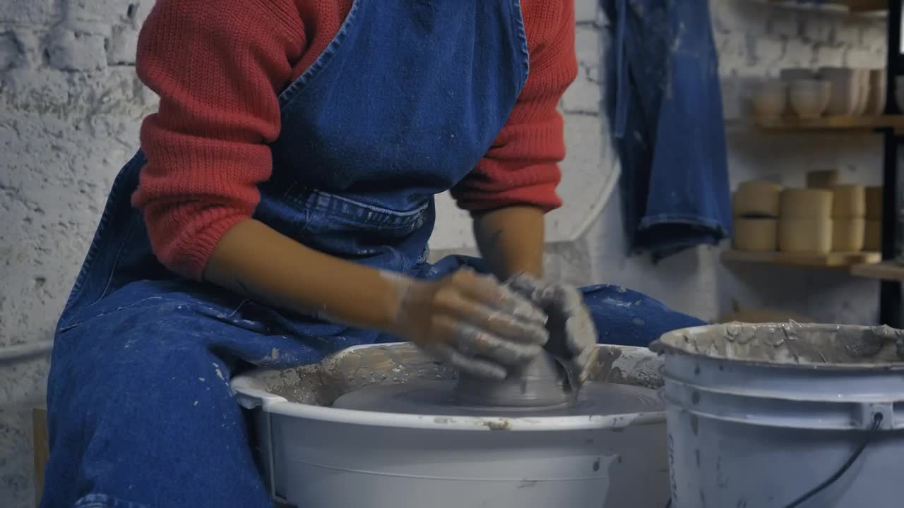 Free Stock Video Woman In A Pottery Workshop Working With Clay Live Wallpaper - Free Download