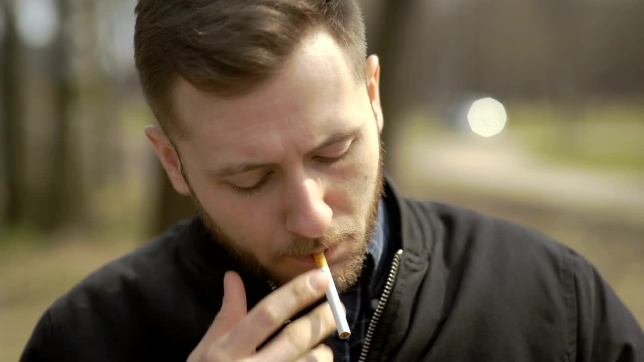 Stock Video Man Lits A Cigarett Animated Wallpaper - Free Download