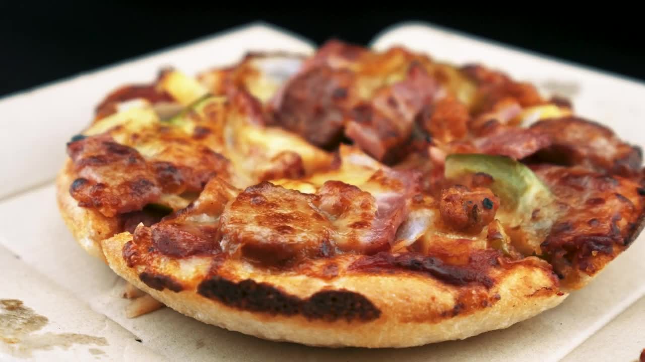 Stock Video Little Pizza Slowly Turning Animated Wallpaper - Free Download