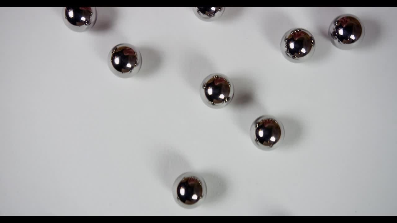 Stock Video Metal Pellets Roll From Bottom To To Animated Wallpaper - Free Download