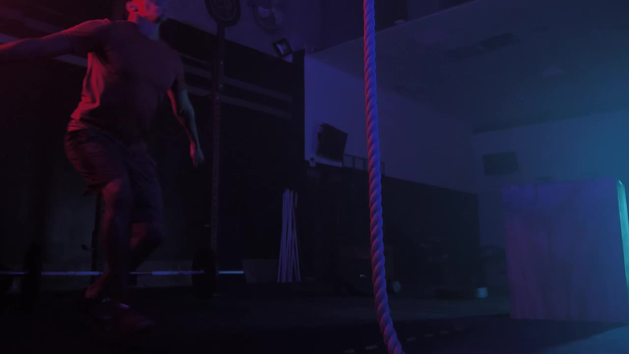 Stock Video Crossfit Man While Training Climbing A Rope Live Wallpaper For PC - Free Download