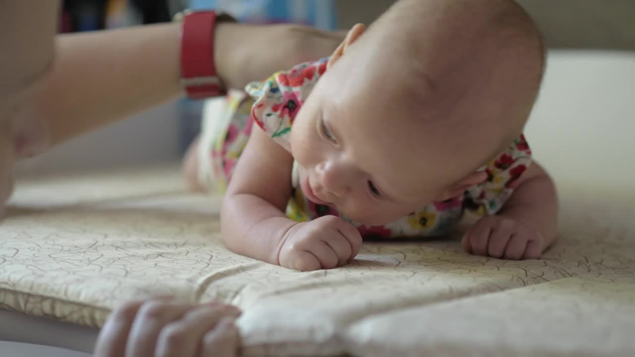 Stock Video Mother Rubbing Her Young Bab Animated Wallpaper - Free Download