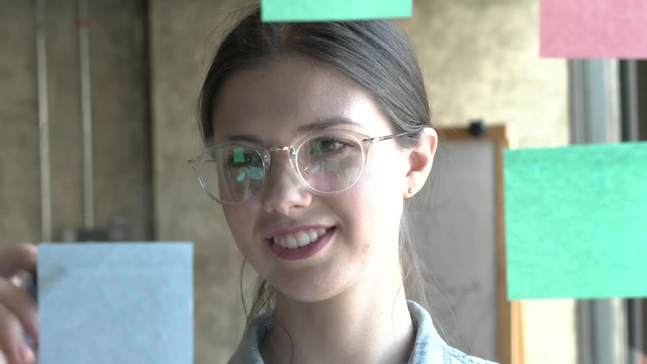 Stock Video Face Of A Woman Writing Ideas On Sticky Notes Live Wallpaper For PC - Free Download