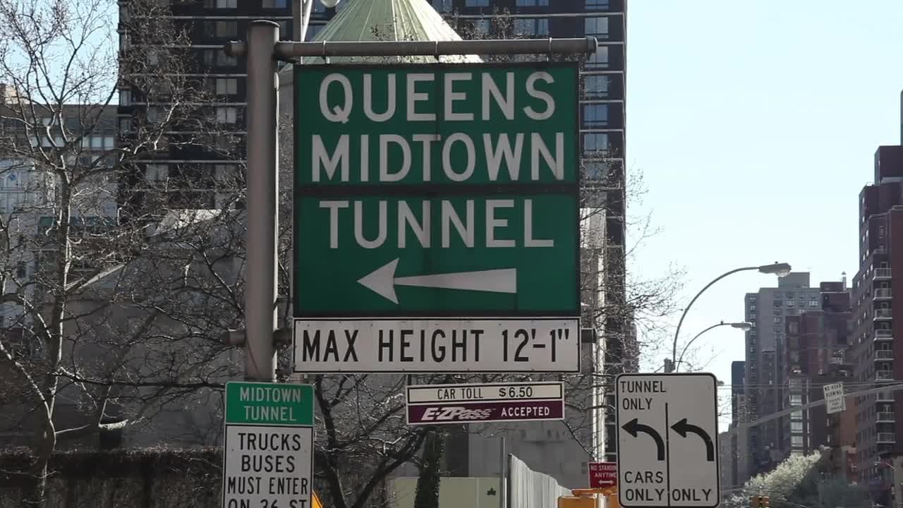 Free Video Stock Street Signs Leading To A Tunnel Live Wallpaper - Free Download