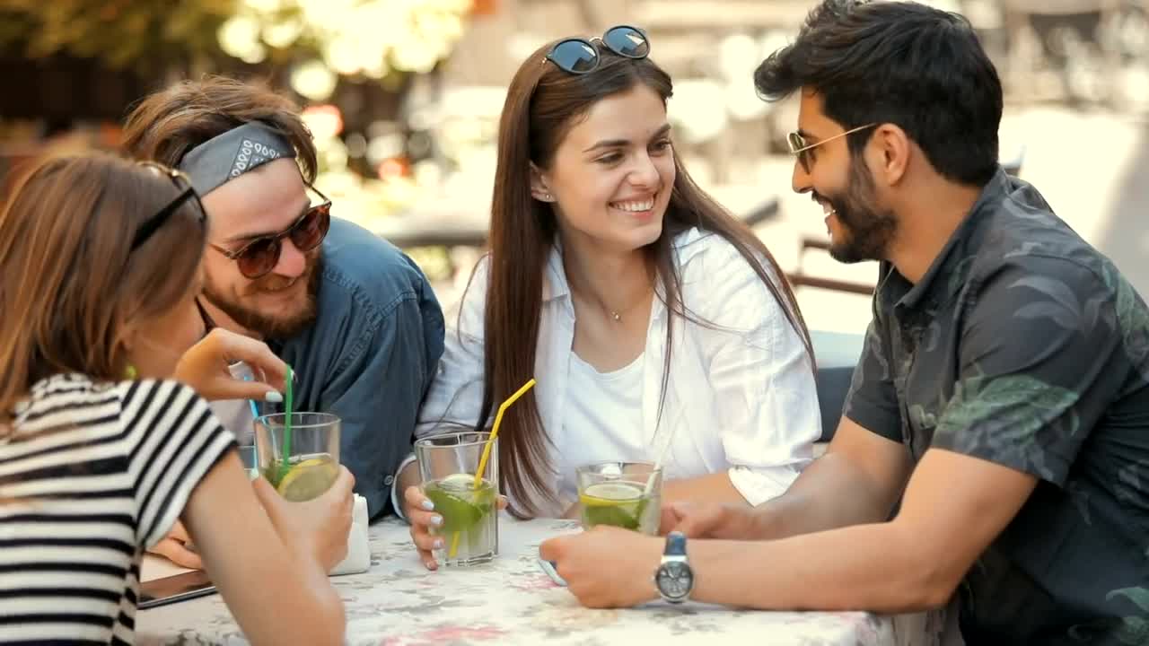 Stock Video Happy Friends Chat While Having Drinks Outdoors Animated Wallpaper - Free Download