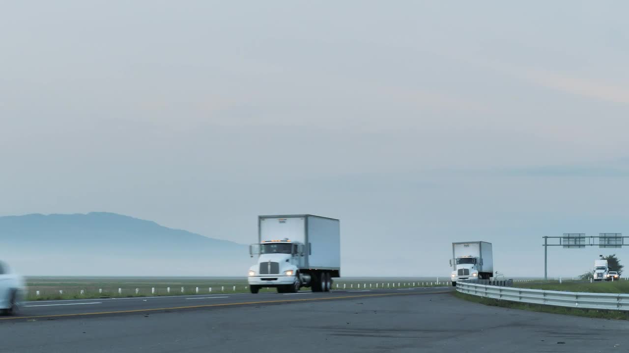 Free Video Stock trailers on a foggy road Live Wallpaper - Free Download