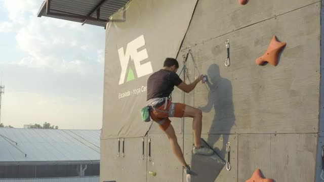 Stock Video Descending A Large Mountaineering Wall With A Rope  Smal Live Wallpaper For PC - Free Download