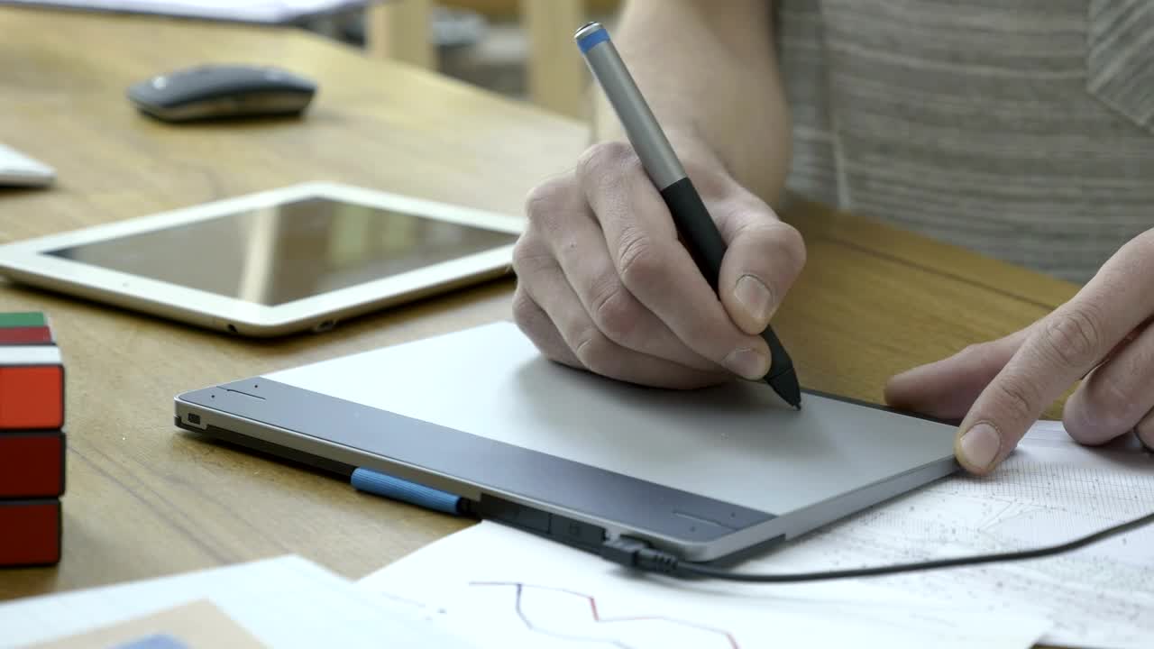 Stock Video Graphic Designer Working With A Graphic Tablet Live Wallpaper For PC - Free Download
