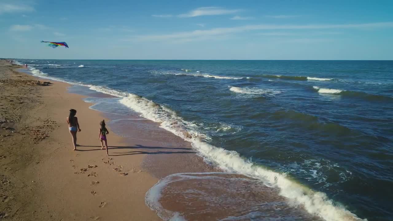 Stock Video Girls Flying A Kite On The Beach Live Wallpaper For PC - Free Download