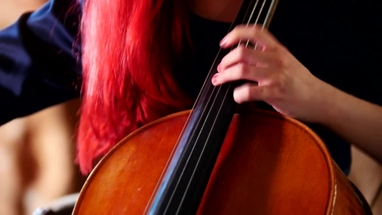 Video Stock Red Haired Woman Playing The Cello Live Wallpaper Free - Free Download