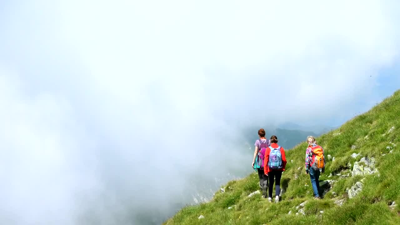 Stock Video Family Hiking In Misty Mountains Live Wallpaper For PC - Free Download