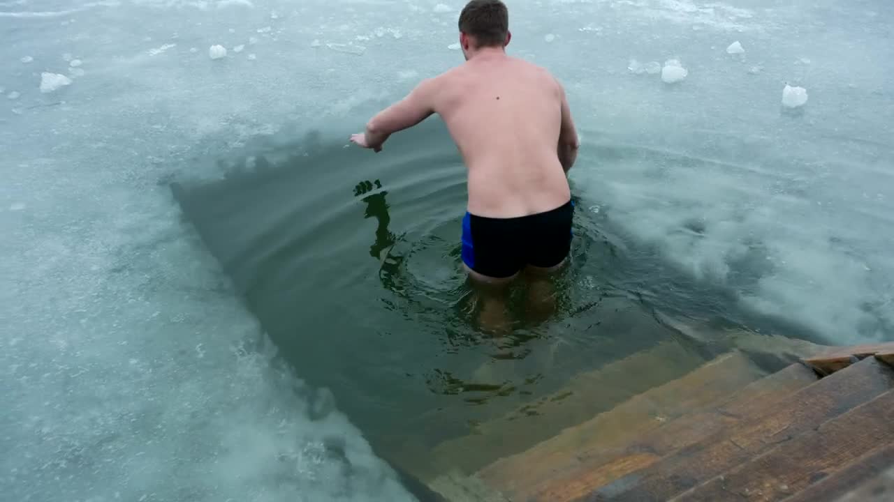 Stock Video Man Taking An Ice Water Bath Therap Animated Wallpaper - Free Download