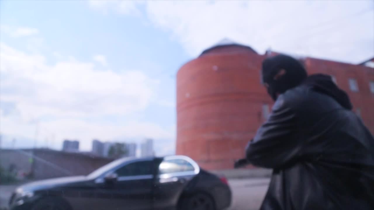 Stock Video Masked Robber Smashing A Windo Animated Wallpaper - Free Download