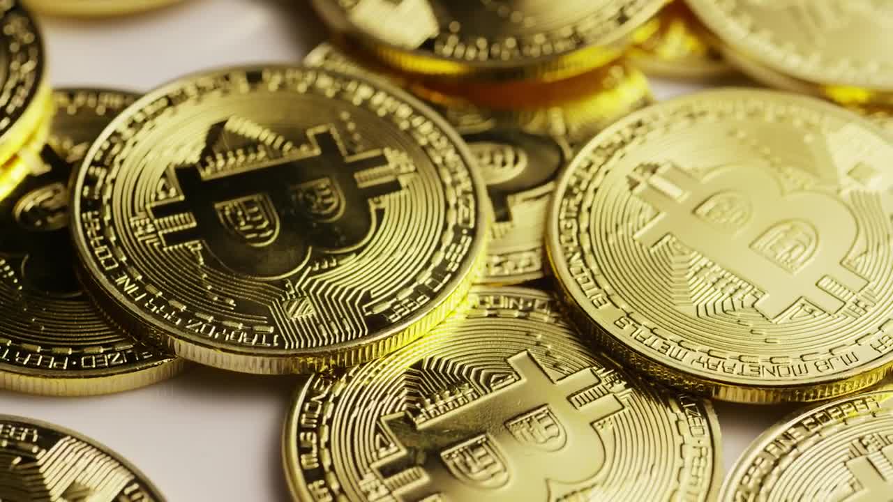 Stock Video Golden Bitcoin Coins Slowly Spinning Live Wallpaper For PC - Free Download