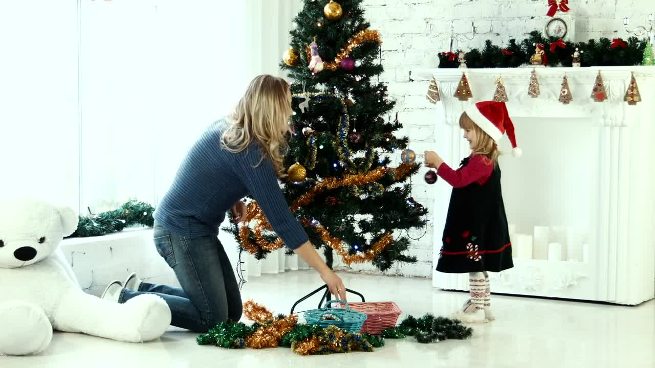 Stock Video Mother And Daughter Decorating The Christmas Tre Animated Wallpaper - Free Download