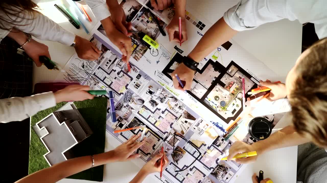 Free Video Stock top view of creative architects working on a project Live Wallpaper - Free Download