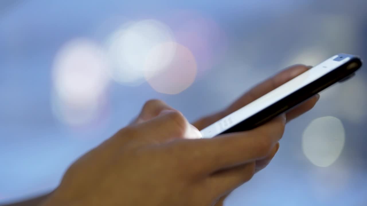 Stock Video Hands Texting On A Mobile Phone At Night Animated Wallpaper - Free Download