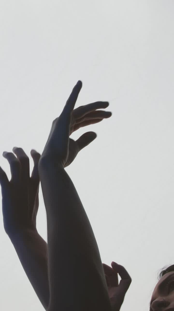 Stock Video Contemporary Dancers Hands On A Light Background Live Wallpaper For PC - Free Download