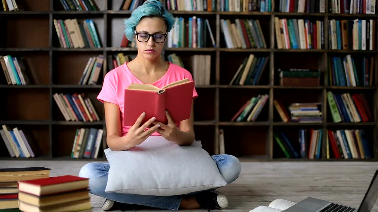 Stock Video Girl Studying A Book She Starts To Fall Asleep Live Wallpaper For PC - Free Download
