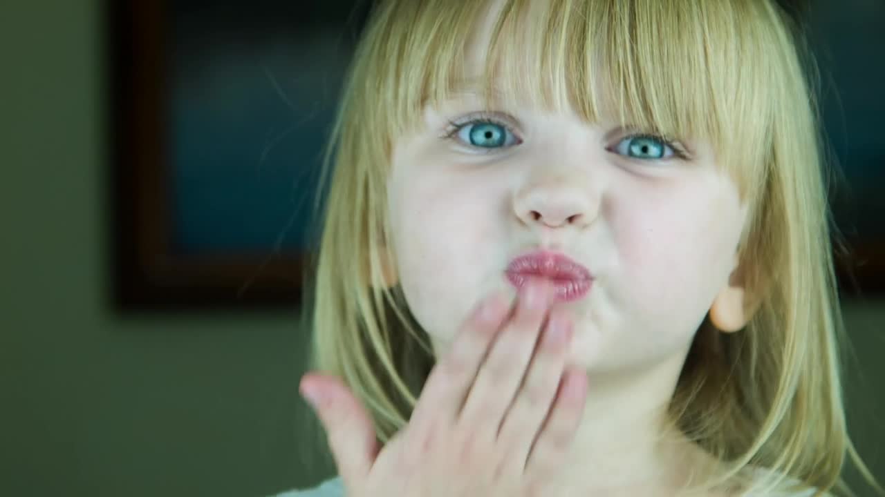Stock Video Little Blonde Girl Send A Kiss Animated Wallpaper - Free Download