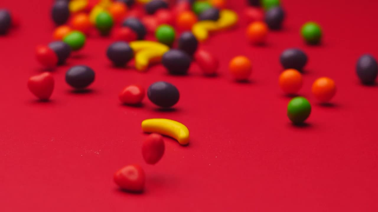 Stock Video Fruit Shaped Candies Sliding On A Surface Live Wallpaper For PC - Free Download