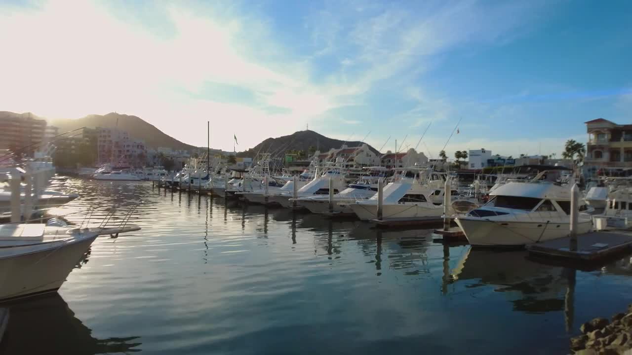 Stock Video Panorama Of A Tourist Port Full Of Boats And Sailboats Live Wallpaper - Free Download