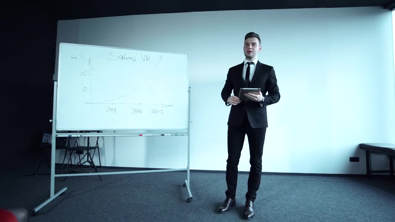 Stock Video Confident Young Businessman Doing A Presentation Live Wallpaper For PC - Free Download