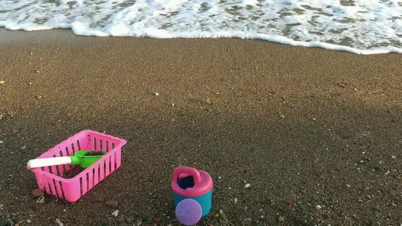 Free Video Stock toys on the sand by the sea Live Wallpaper - Free Download