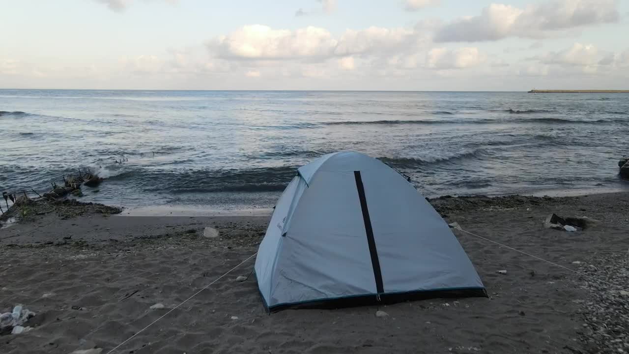 Free Video Stock tent at the edge of the sea on a beach Live Wallpaper - Free Download