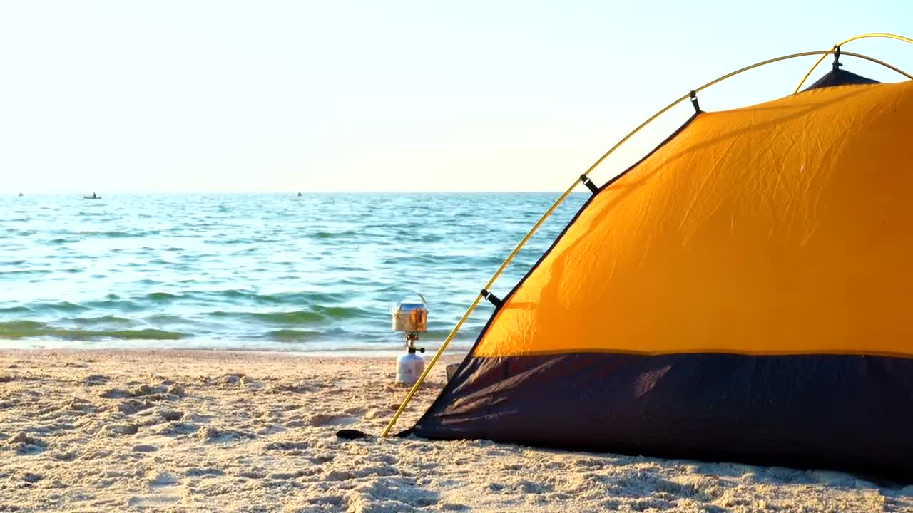 Stock Video Black And Yellow Camping Tent On The Beach Live Wallpaper For PC - Free Download