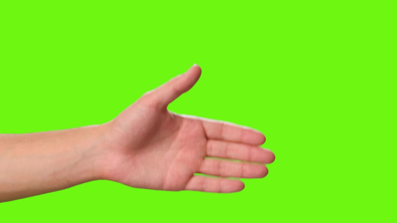 Stock Video Hands Of Two People Shaking Hands On A Green Background Animated Wallpaper - Free Download