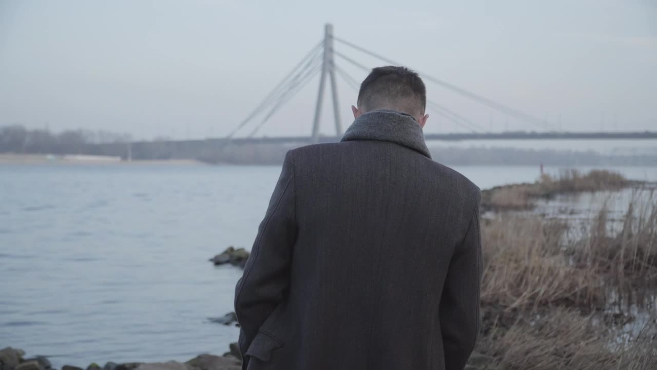 Stock Video Lonely Man Walking And Thinking Along Urban River Animated Wallpaper - Free Download