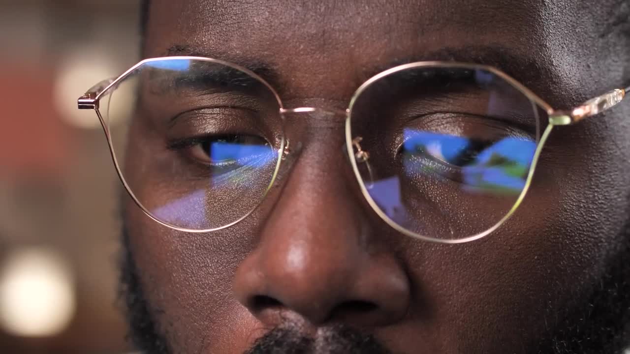 Stock Video Film Reflected On A Pair Of Glasses Live Wallpaper For PC - Free Download