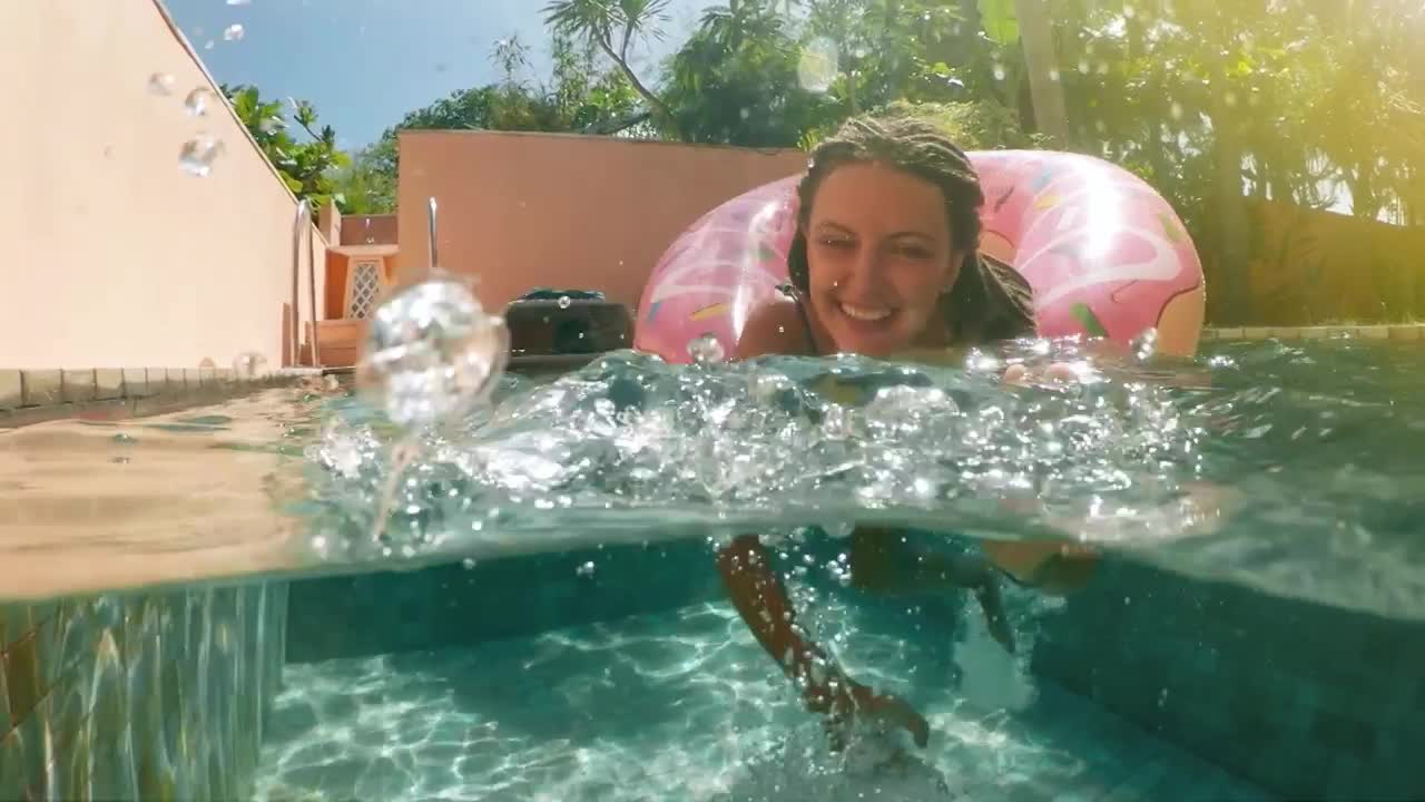 Stock Video Happy Woman In The Swimming Pool Enjoying Vacations Animated Wallpaper - Free Download