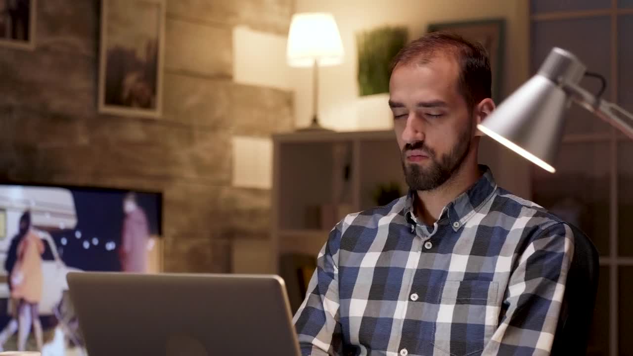 Stock Video Creative Man Stops To Think While Working On Laptop Live Wallpaper For PC - Free Download