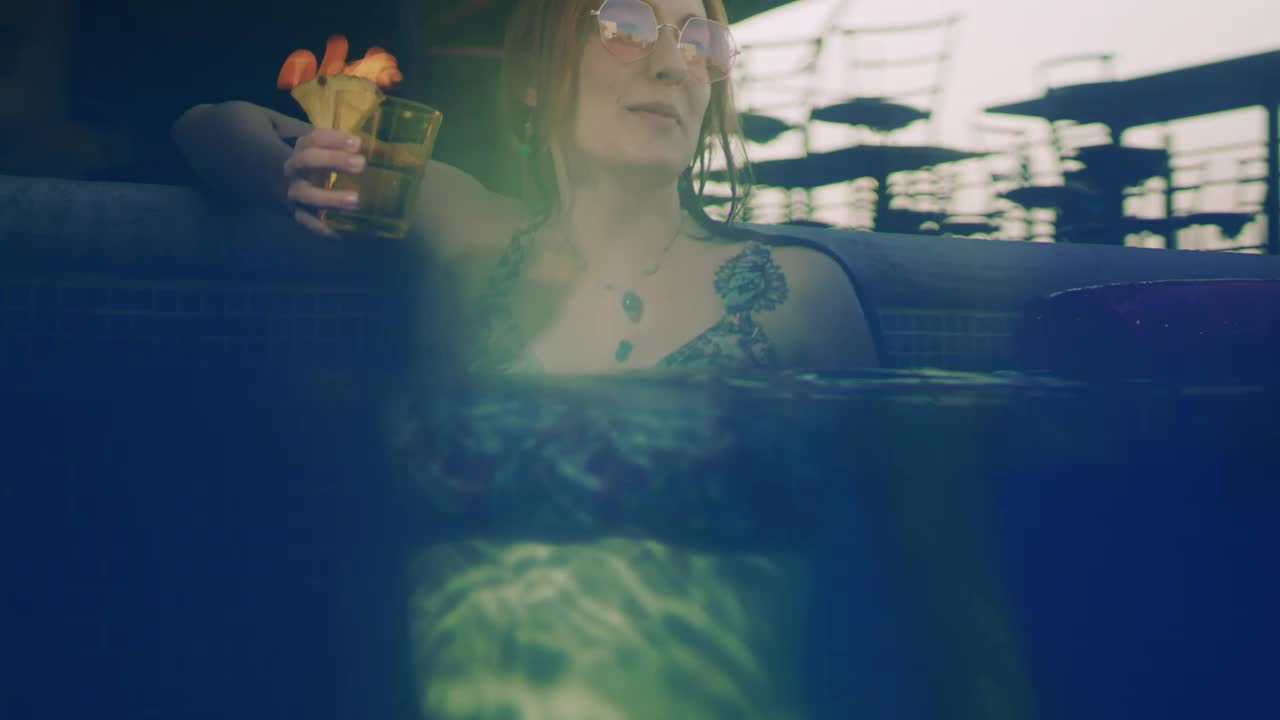 Stock Video Happy Young Woman Enjoying A Cocktail In The Pool Animated Wallpaper - Free Download