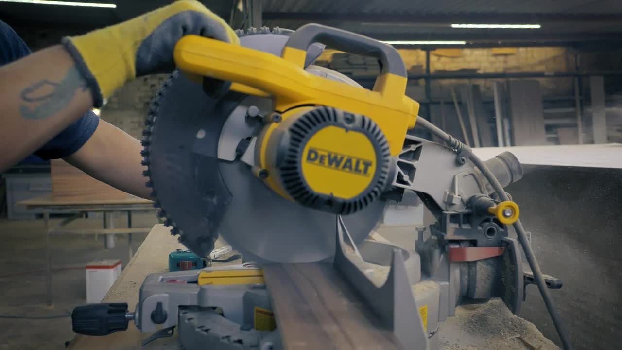 Video Stock Carpenter Operating An Electric Saw In A Workshop Live Wallpaper For PC - Free Download